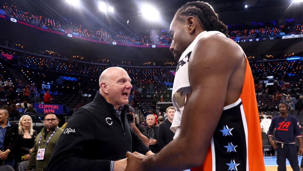 Kawhi Leonard and Clippers owner Steve Ballmer at a game