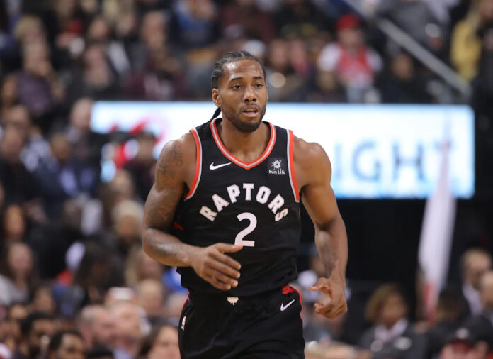 Kawhi Leonard in Toronto Raptors jersey after NBA approved trade from Los Angeles Clippers