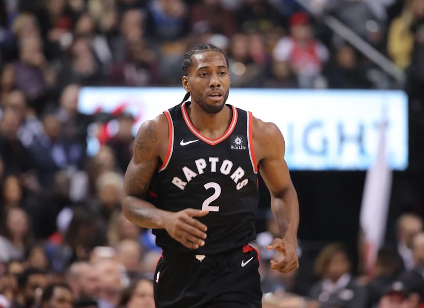 Kawhi Leonard in Toronto Raptors jersey after NBA approved trade from Los Angeles Clippers