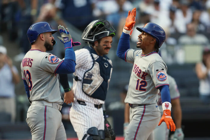 Francisco Lindor celebrates after hitting a grand slam at Yankee Stadium in the Mets' 12-2 Subway Series blowout