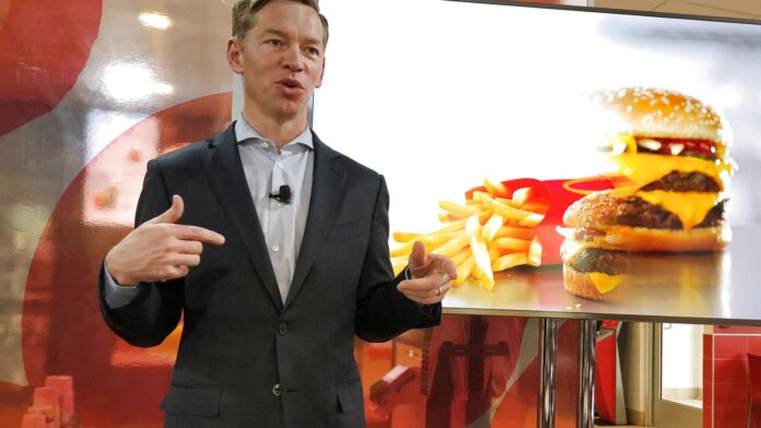 McDonald's restaurant exterior signage representing the chain's McDonald's NEXT expansion strategy unveiled at the September 2026 investor day