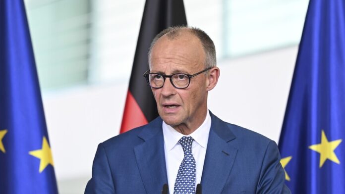 German Chancellor Friedrich Merz speaking at joint press conference with EU Council President António Costa on EU multiannual financial framework budget cuts