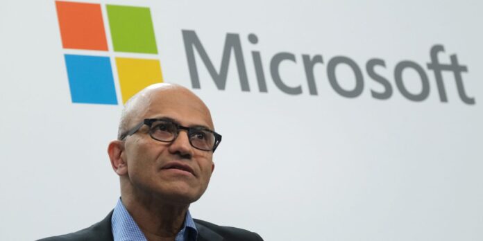 Microsoft Copilot AI interface shown on a laptop in an enterprise office setting