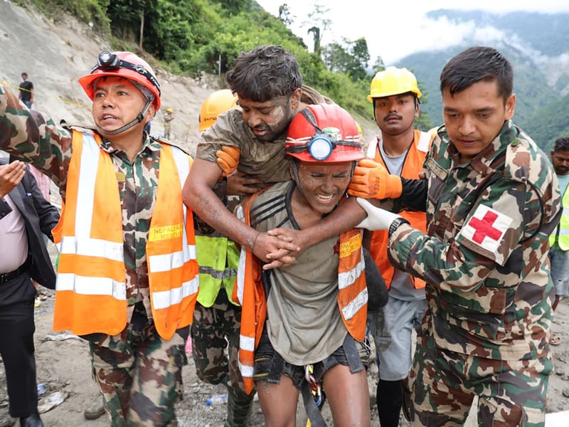 Nepal Army and rescue teams work to extract trapped workers from a flooded hydropower tunnel in Nuwakot district following August 2026 glacial lake outburst