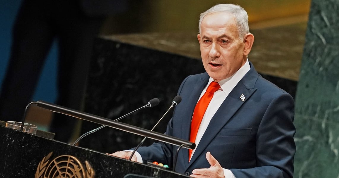 Benjamin Netanyahu speaking at the podium of the UN General Assembly hall