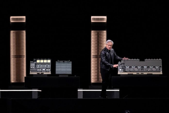 NVIDIA CEO Jensen Huang with Blackwell GPU chip as NVDA stock falls 2.47% on September 10 2026