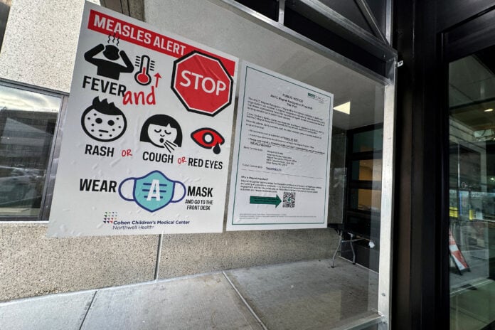 Health workers administering measles vaccines during Pennsylvania outbreak as CDC death count dispute continues