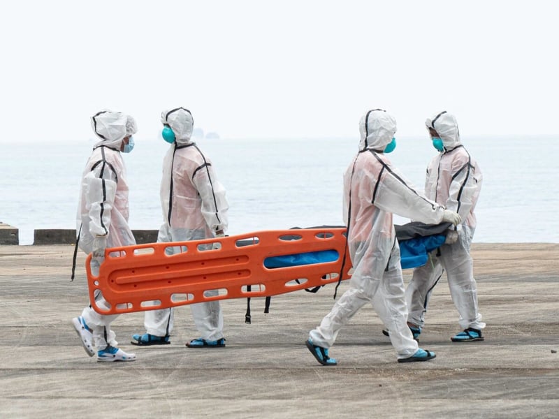 Philippine Coast Guard rescuers work at the site of the M/V June Aster ferry fire off Coron, Palawan, September 2026