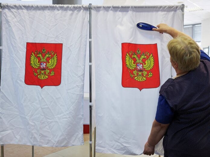 Voters queue at polling stations during Russia's State Duma election September 2026