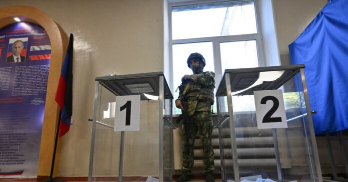 Polling station in Donetsk during Russia State Duma election 2026 annexed territories