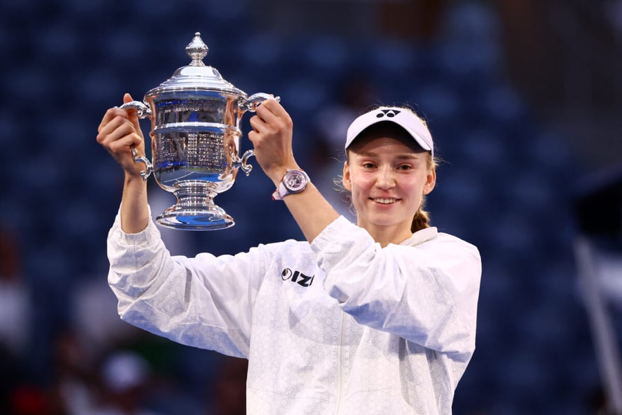 Elena Rybakina holds the US Open 2026 women's singles trophy after defeating Aryna Sabalenka