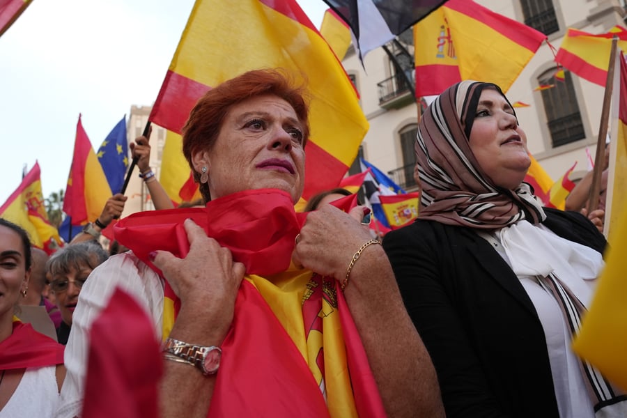 Protesters march through a Spanish city in solidarity with Ceuta migrants September 2026