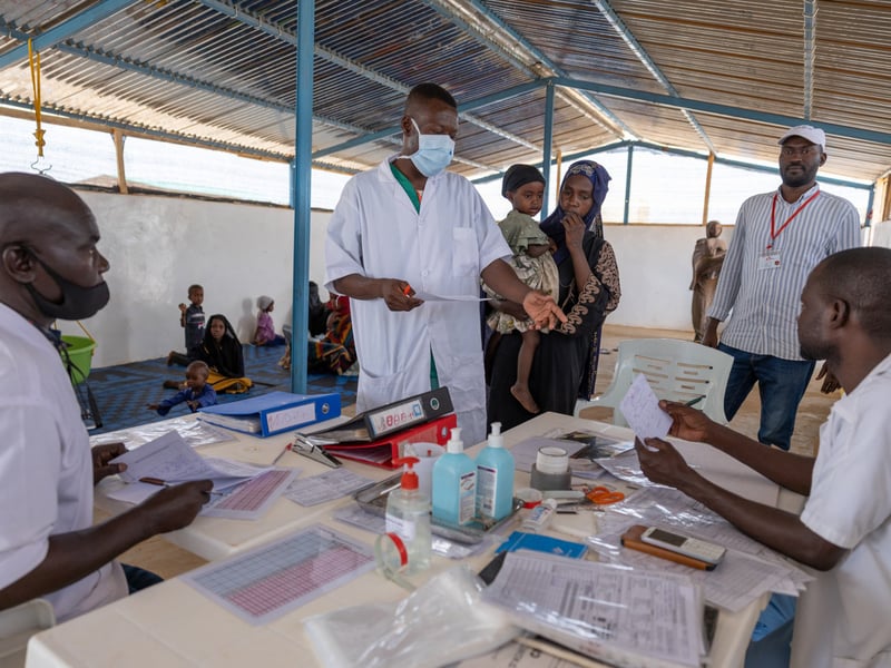 Sudanese and Chadian refugees displaced by the Sudan Civil War, representing the collapse of health infrastructure across Darfur