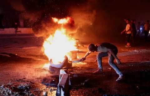 Protesters in Syria during demonstrations over rising fuel prices