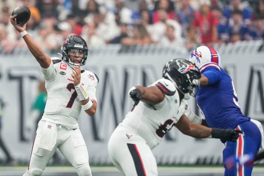 Houston Texans defense pressures Josh Allen during the 23-19 NFL Week 1 win over the Buffalo Bills