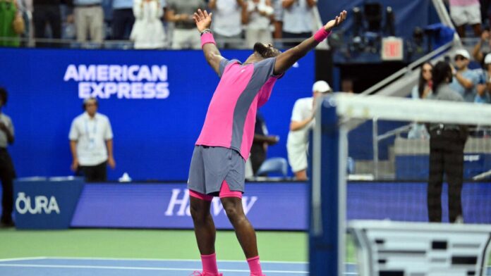 Frances Tiafoe pumps his fist after winning the 2026 US Open quarterfinal against Alex Michelsen