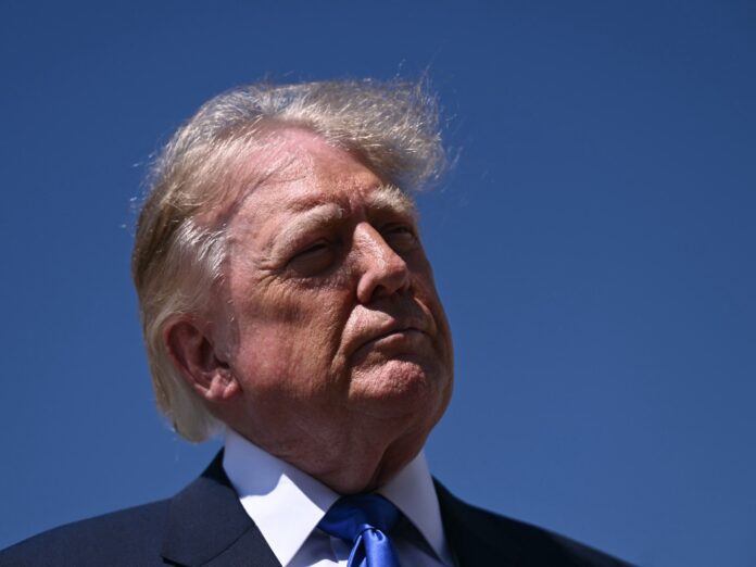 Donald Trump speaks to reporters at Joint Base Andrews before boarding Air Force One, September 9, 2026