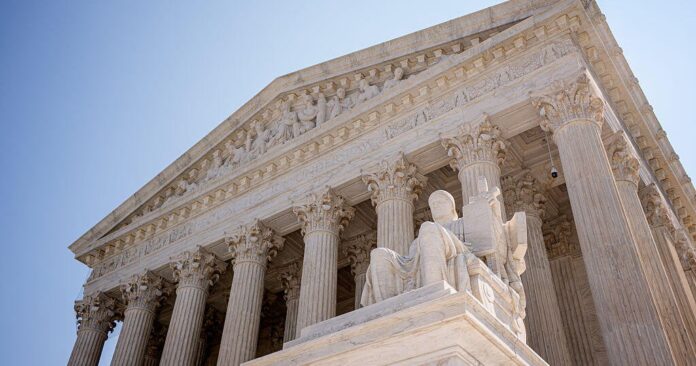 Supreme Court building with U.S. flag as Trump administration files emergency application over SAVE voter database