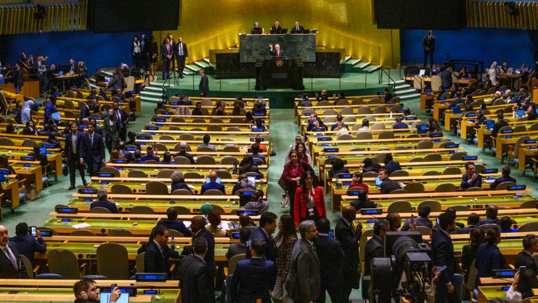Rows of empty seats at the UN General Assembly as delegations walk out during Netanyahu's address
