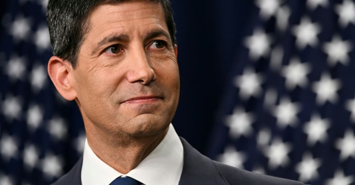 Fed Chair Kevin Warsh speaking at Jackson Hole Economic Symposium August 28 2026 rate hike signal NQ futures