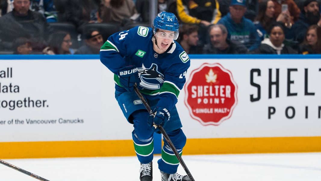 Vancouver Canucks players on the ice during an NHL game in 2026