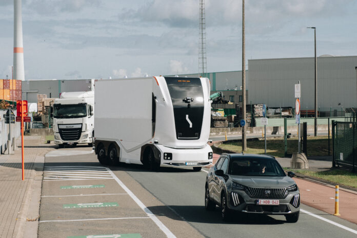 An Einride autonomous truck on a public road in the port of Antwerpen.