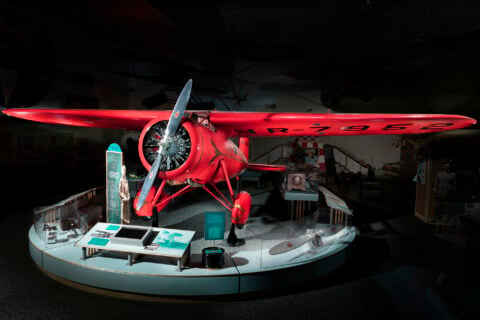 Amelia Earhart's red Lockheed Vega 5B monoplane on display at the Smithsonian National Air and Space Museum