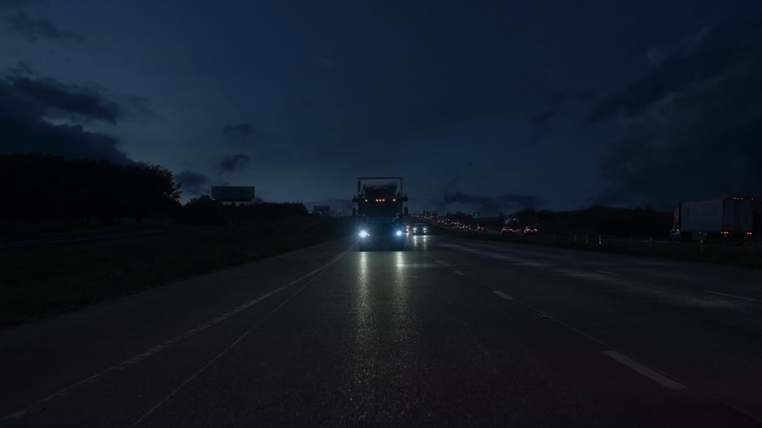 Aurora autonomous truck travelling on a highway at night