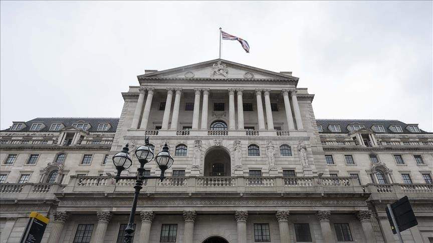 The columned facade of the Bank of England building in London under an overcast sky