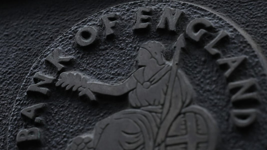 Close-up of the Bank of England emblem, showing the bank's name around the figure of Britannia
