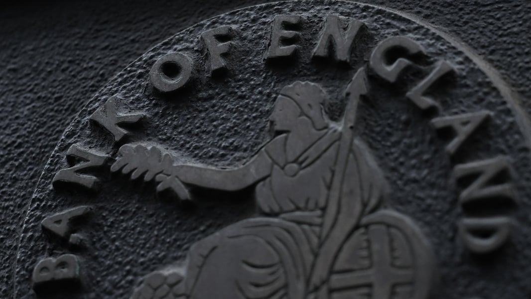 Close-up of the Bank of England emblem, showing the bank's name around the figure of Britannia