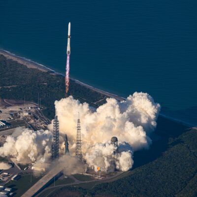Blue Origin's New Glenn rocket climbing away from Launch Complex 36 at Cape Canaveral Space Force Station in a cloud of exhaust
