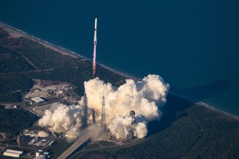 Blue Origin's New Glenn rocket climbing away from Launch Complex 36 at Cape Canaveral Space Force Station in a cloud of exhaust