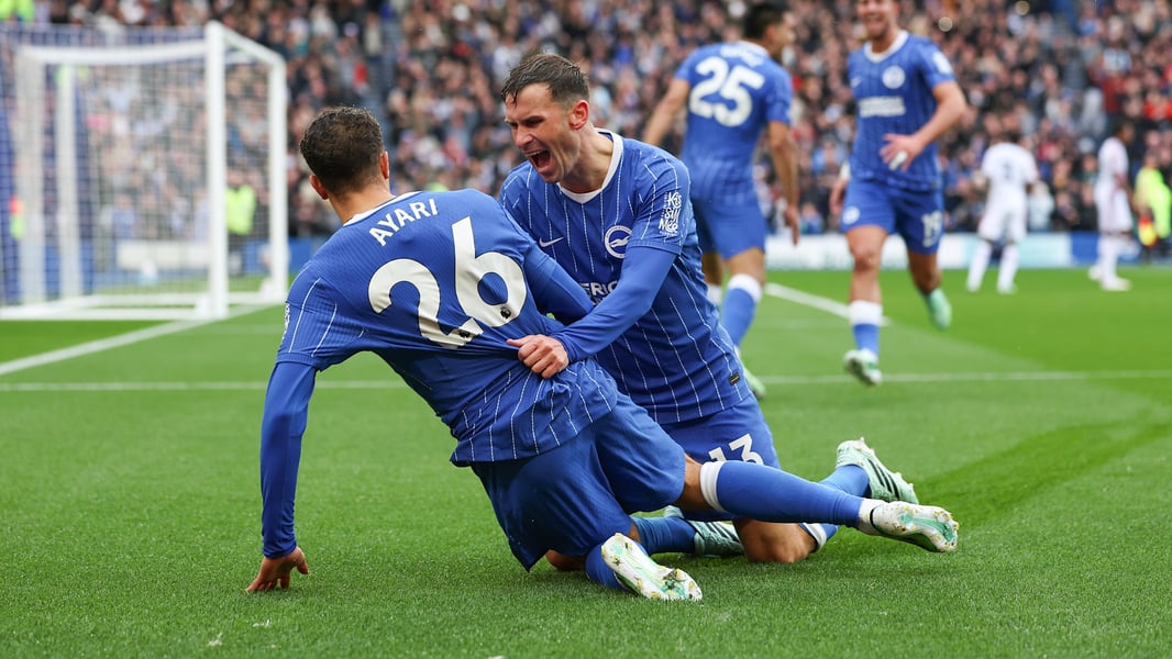 Brighton's Yasin Ayari slides on his knees in celebration with Pascal Gross after scoring against Crystal Palace at the Amex