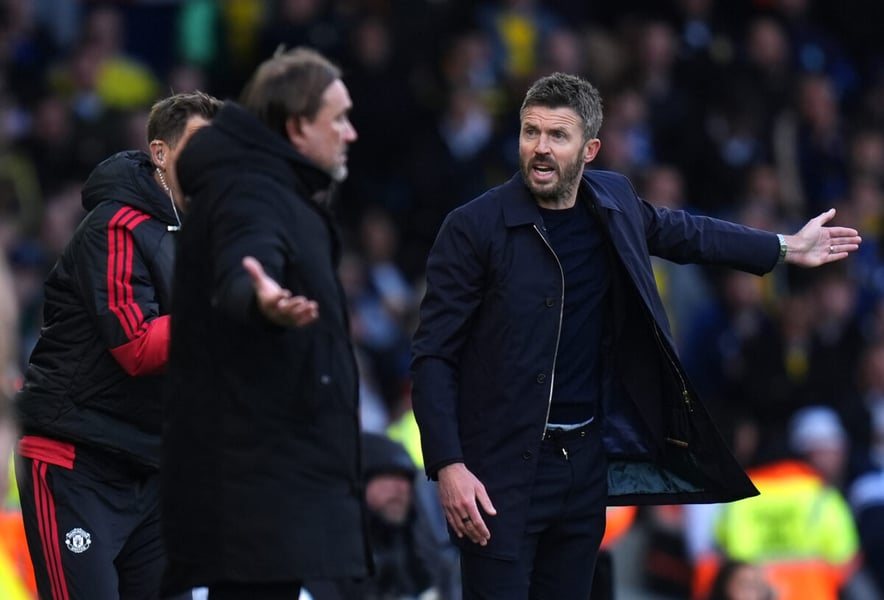 Manchester United manager Michael Carrick spreads his arms and shouts on the touchline at Elland Road