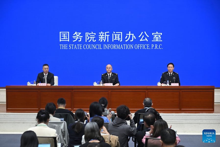 Chinese customs officials at a State Council Information Office press conference in Beijing on January to September trade data