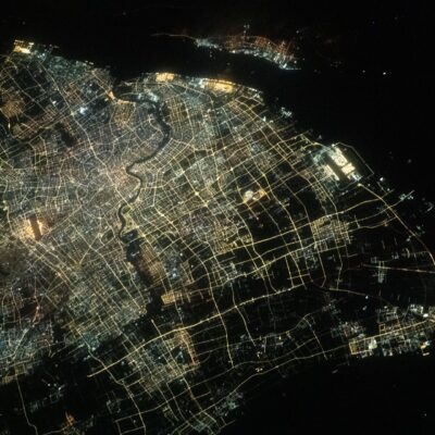 Aerial night view of Shanghai's city lights and the Huangpu River photographed from the International Space Station