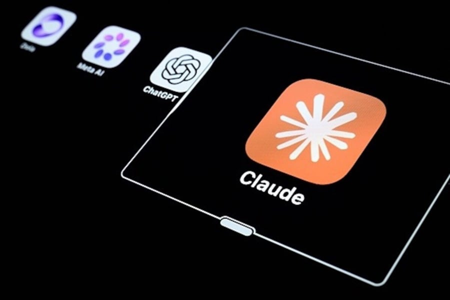 The orange Claude app icon on a black screen, next to the icons for ChatGPT, Meta AI and another AI app