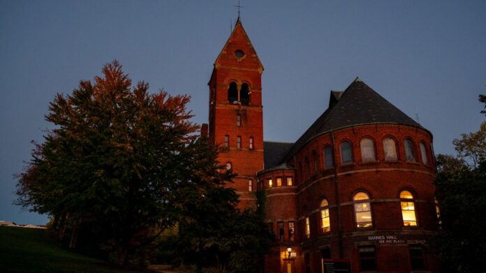 A Cornell University campus building in Ithaca, New York, at dusk