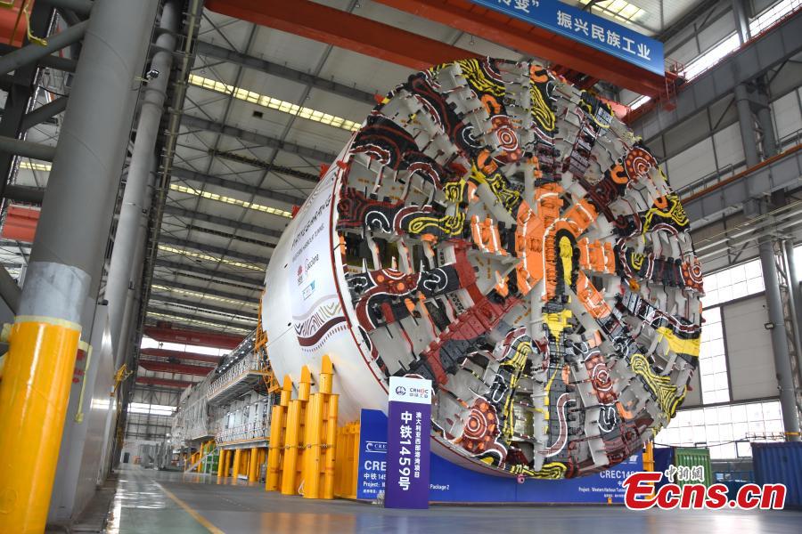 Cutterhead of a 15.7-meter shield tunneling machine in a Zhengzhou factory hall