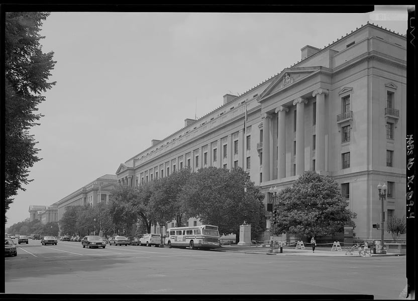 Archival view looking west from the Justice Department building toward the Departmental Auditorium along Constitution Avenue