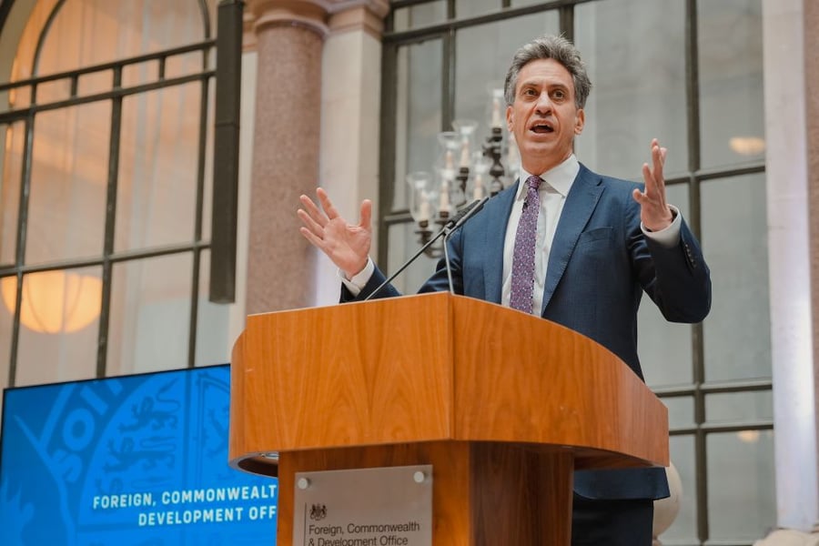 Ed Miliband speaking at a lectern marked Foreign, Commonwealth and Development Office
