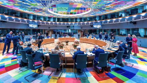 EU leaders' negotiating room at the Europa building in Brussels during the October 15 summit, with a round table under a colourful ceiling