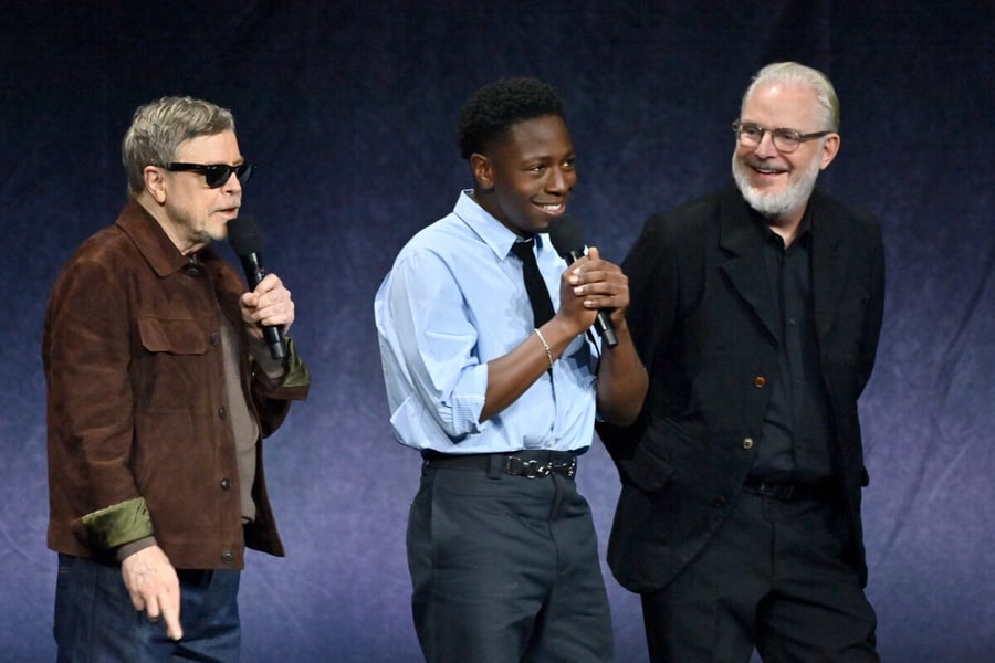 Mark Hamill, David Jonsson and director Francis Lawrence on stage at Lionsgate's CinemaCon presentation for The Long Walk