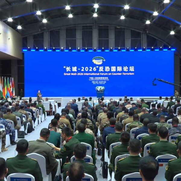 Delegates seated in a hall at the opening of the Great Wall-2026 International Forum on Counter-Terrorism in Beijing