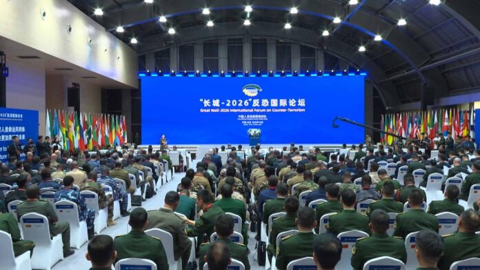 Delegates seated in a hall at the opening of the Great Wall-2026 International Forum on Counter-Terrorism in Beijing