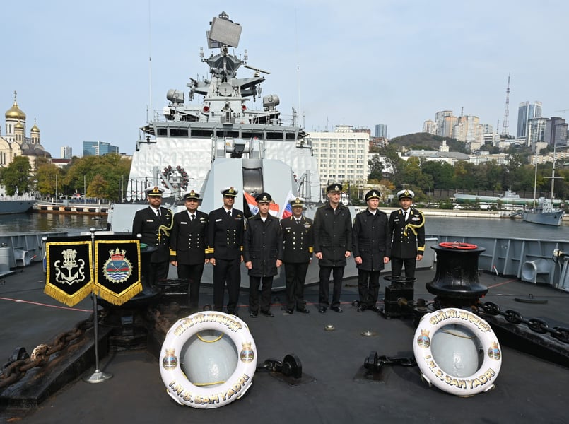 Naval officers stand on the deck of the Indian frigate INS Sahyadri in Vladivostok ahead of the Indra 2026 exercise
