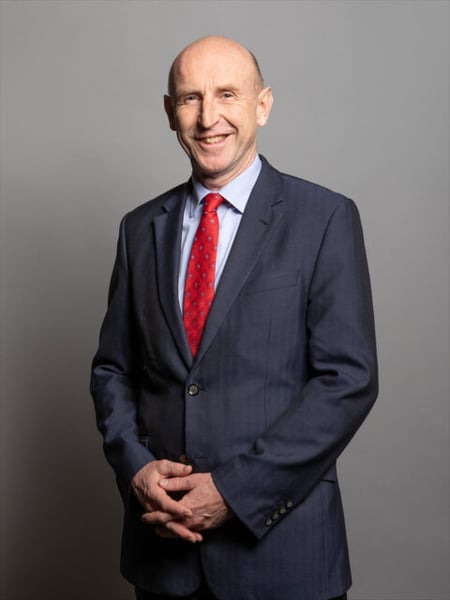 John Healey, Chancellor of the Exchequer, in a suit and red tie in his official UK Parliament portrait