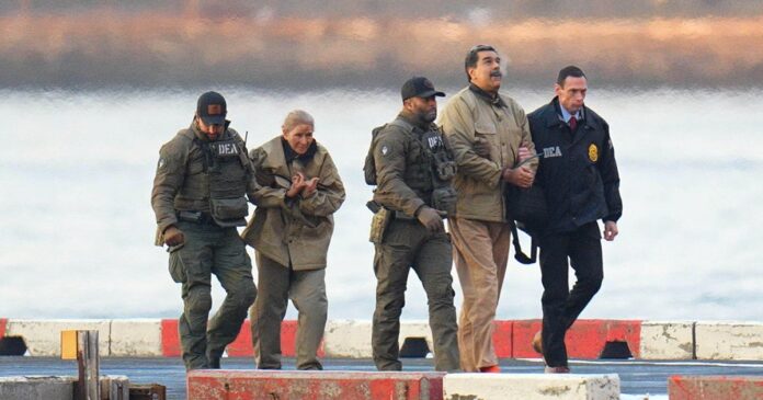 Nicolas Maduro and Cilia Flores walk beside DEA agents on a Manhattan helipad on the way to federal court
