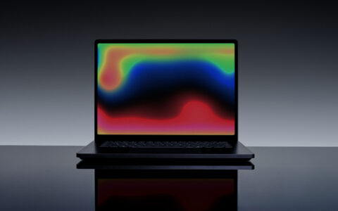 Microsoft Surface Laptop Ultra with a colorful abstract wallpaper on its screen